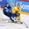 HELSINKI, FINLAND - JANUARY 4: Sweden's Dmytro Timashov #17 stickhandles the puck with pressure from Finland's Kasperi Kapanen #24 during semifinal round action at the 2016 IIHF World Junior Championship. (Photo by Matt Zambonin/HHOF-IIHF Images)

